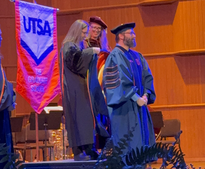 Aaron Galliher at UTSA's Doctoral Conferral Ceremony in December 2024