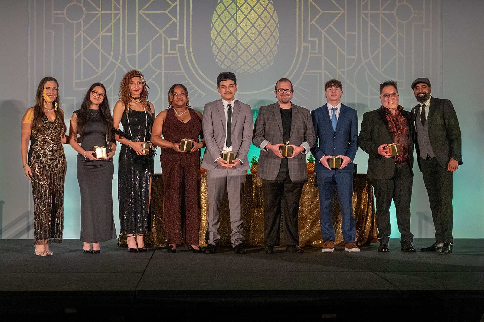 A group of students receiving scholarships at the 2025 SAHLA Pineapple Awards Gala.